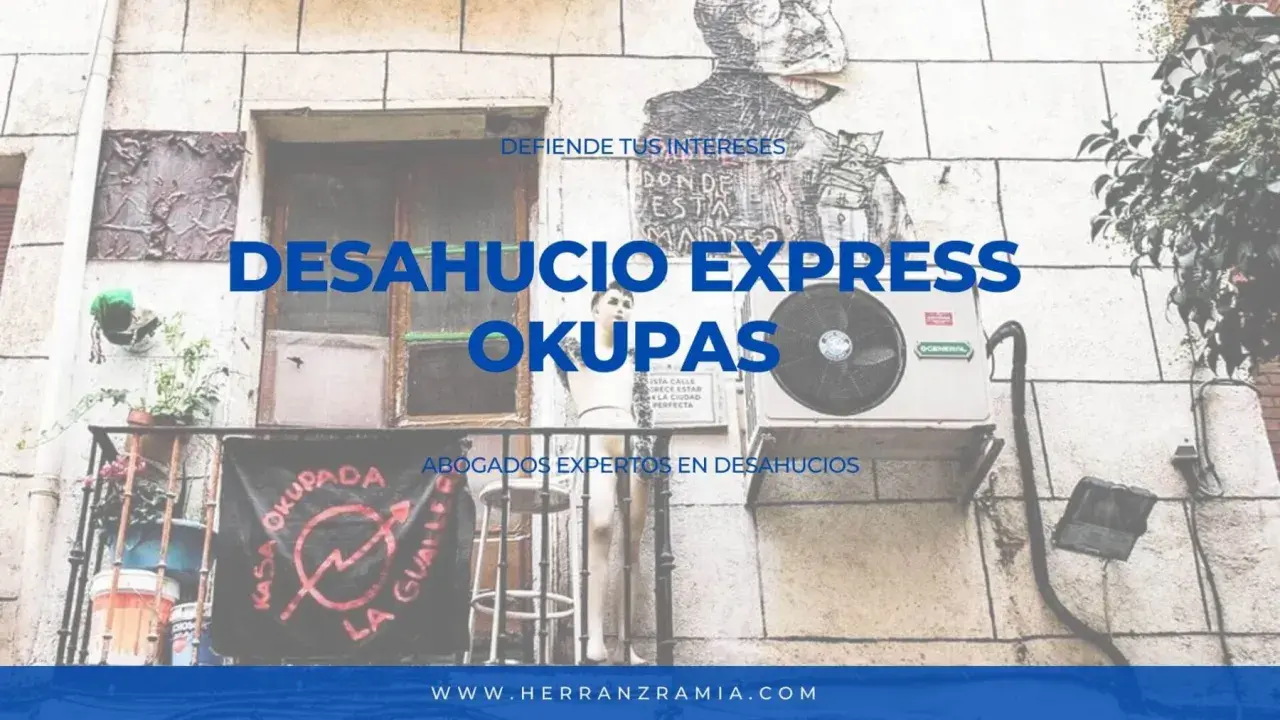 Abogados expertos en desahucio okupas. Fachada con mural y cartel "Kasa Okupada".