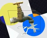 Grifo con agua cayendo sobre tijeras. ¿Quién paga la factura de esta fuga de agua?