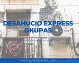 Abogados expertos en desahucio okupas. Fachada con mural y cartel "Kasa Okupada".