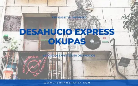 Abogados expertos en desahucio okupas. Fachada con mural y cartel "Kasa Okupada".