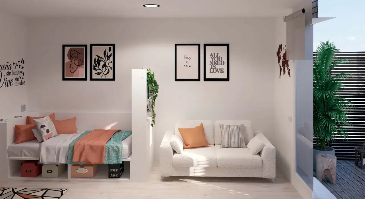 Interior moderno de la residencia Garbi: cama individual, sofá acogedor, arte en la pared y plantas.